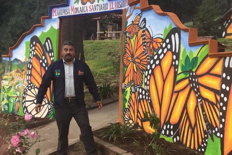 Homero Gomez at the entrance to El Rosario Monarch Butterfly Preserve